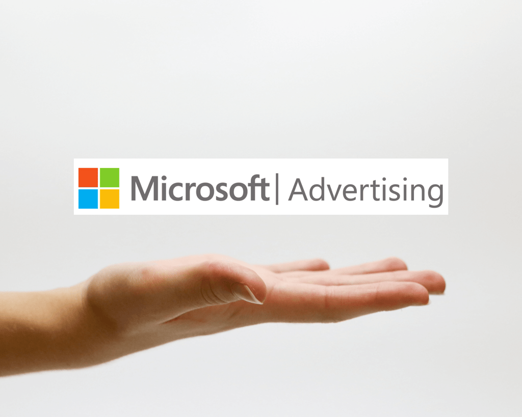 Microsoft Advertising greifende Hand zu Microsoft Advertising
